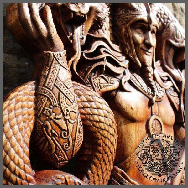 Carved wood Loki and his children