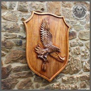 Wood carved family coat of arms