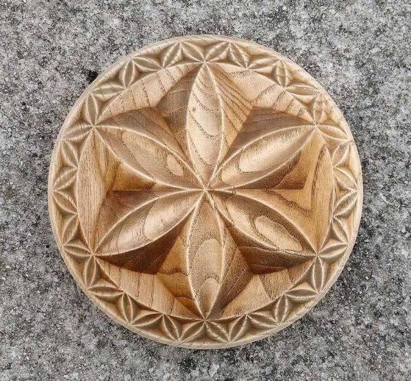 Wood carved Triskel