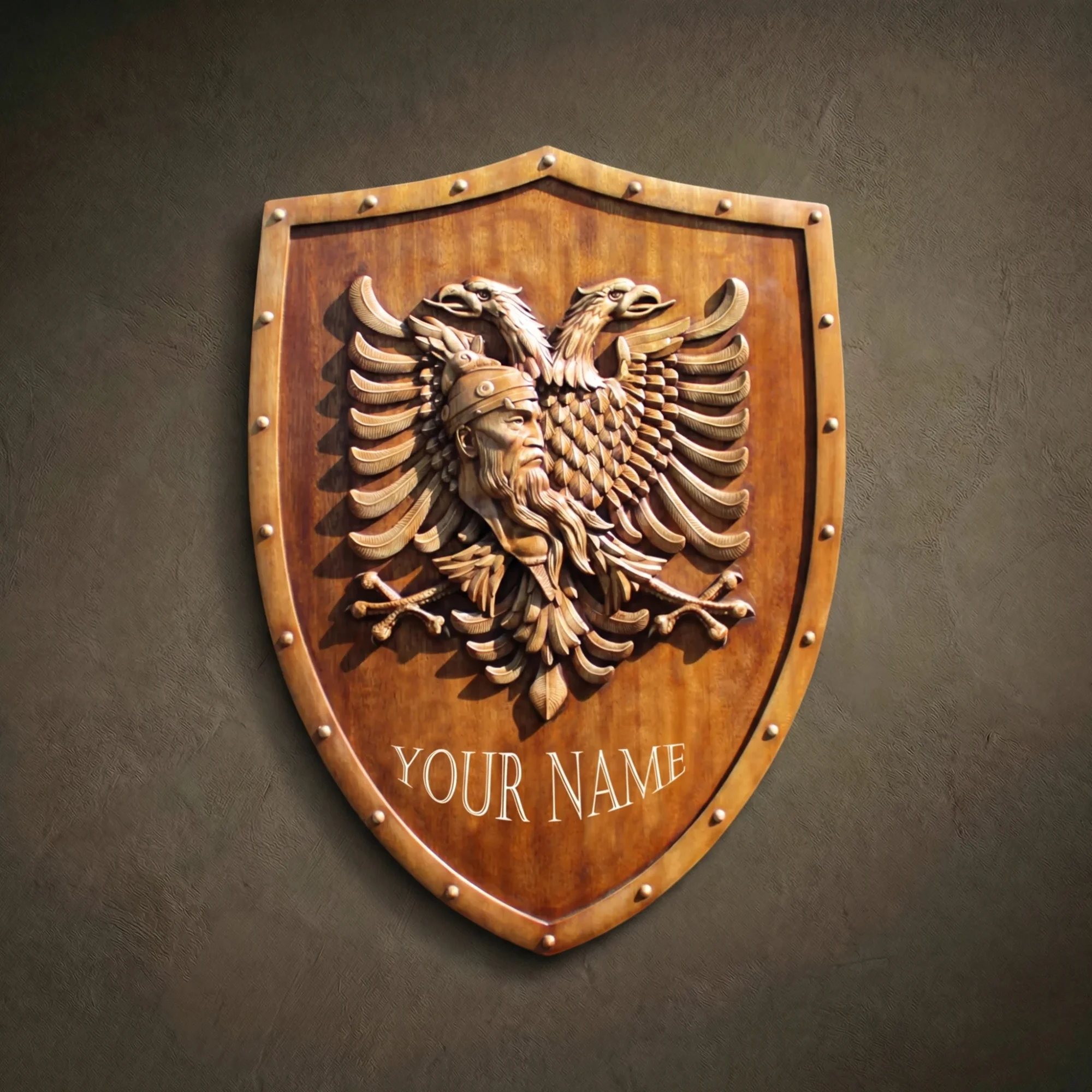 Custom hand-carved Iroko wood coat of arms featuring Gjergj Kastrioti Skanderbeg. This bespoke heraldic relief depicts the profile of the Albanian national hero with his iconic goat-head helmet and a central shield with a double-headed eagle. Intricate scrolling mantling and a name banner at the bottom. Finished with natural wax to highlight the premium wood grain. A premier example of historical wood carvings, Albanian heritage art, and custom luxury heraldry.