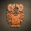 Custom hand-carved Iroko wood family crest for the name "Goedl". This elaborate bespoke heraldic relief features a dual-crest design with two knight's helmets topped with a lion and winged motifs. The shield is quartered with symbols including a rampant lion, fleurs-de-lis, and an antelope. Finished with natural wax to highlight the premium grain. A masterpiece of personalized family heritage and luxury custom wood heraldry.