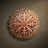 Premium artisan-carved Helm of Awe (Aegishjalmur) wood Carved Plaque featuring light-toned staves on a deep mahogany base. This handcrafted Norse protection symbol is framed by an intricate Celtic knotwork border, creating a luxury statement piece for Viking-themed home decor.