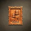 Custom wood carving of two Poodles Iroko wood 3D pet relief in an ornate vertical frame. Personalized dog portrait titled "Keenan" with heart-pattern background, handcrafted memorial gift.