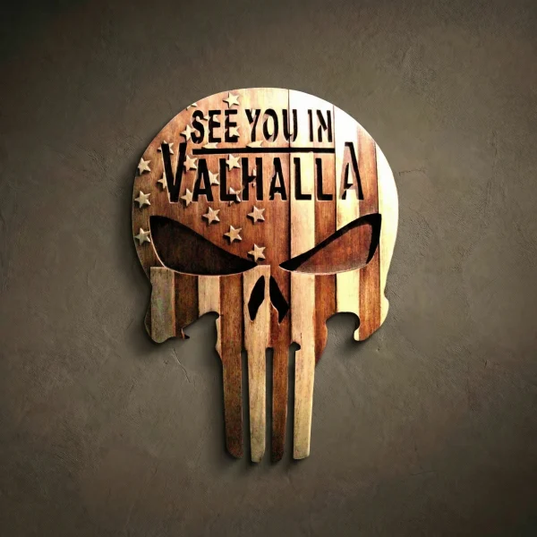 Hand-carved Iroko wood Punisher skull wall art with American flag details. "See You in Valhalla" wooden plaque for military veterans and patriots, featuring solid hardwood texture and detailed patriotic engraving for home office or man cave decor.