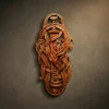 Masterpiece vertical wood relief featuring the legendary Sword of Odin, hand-carved from premium Walnut wood by master Oleg Krotko at his Forged in Wood studio. This artisan sculpture showcases an upright Viking blade entwined with complex Norse serpent knotwork and Elder Futhark runes carved along the fuller. A luxury collector's piece of mythological wall art, perfect for executive offices, private libraries, or high-end Nordic-themed interiors.