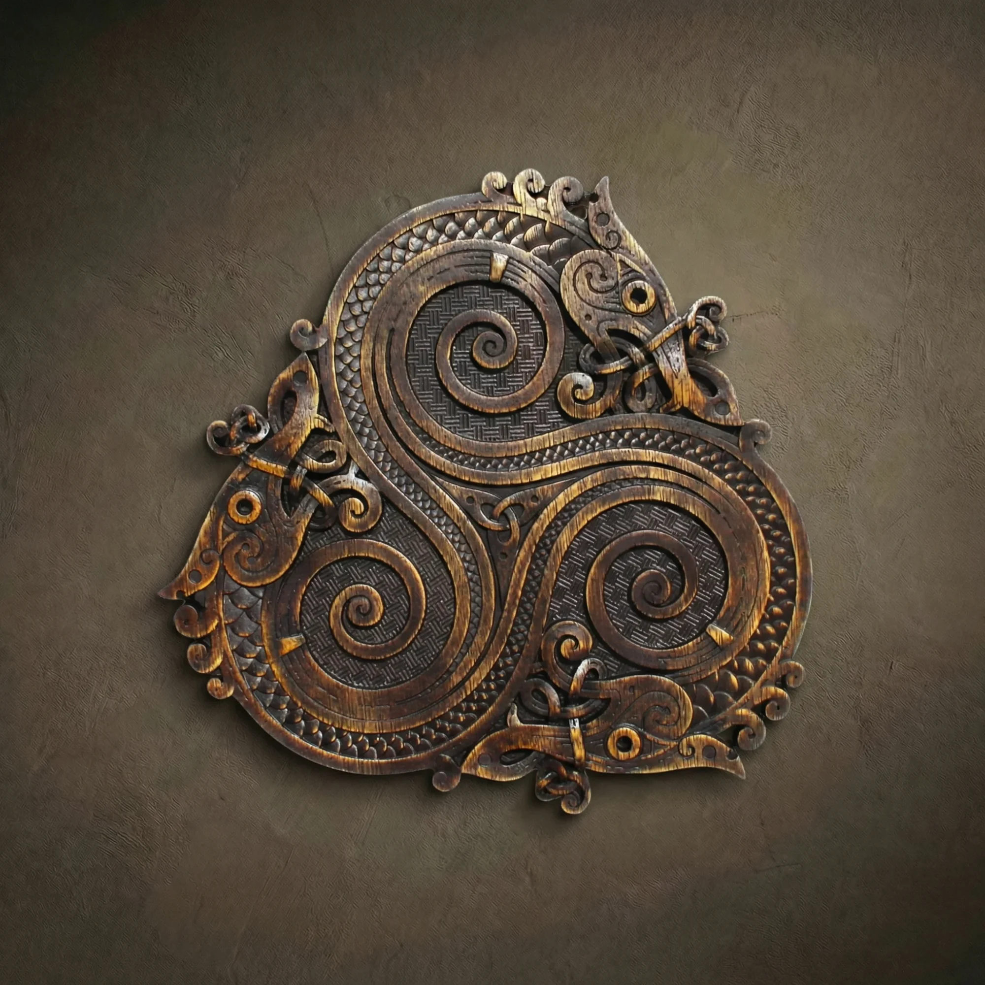 A Norse-inspired triskele wood carving featuring three interlocking serpentine dragons. The relief is decorated with intricate dragon scales, Celtic spirals, and basketweave textures. Finished in a distressed dark oak with gold highlights, creating a weathered Viking-age aesthetic.