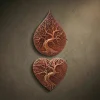 A set of two wall-hanging sculptures carved from solid Iroko hardwood, representing the Tree of Life (Yggdrasil). One piece is shaped like a teardrop and the other like a heart. Both feature intricate high-relief carvings of gnarled trunks and expansive branch networks. Hand-finished with natural oils to showcase the rich, warm wood grain. Symbolic Norse and Celtic-inspired home decor for luxury spiritual interiors.