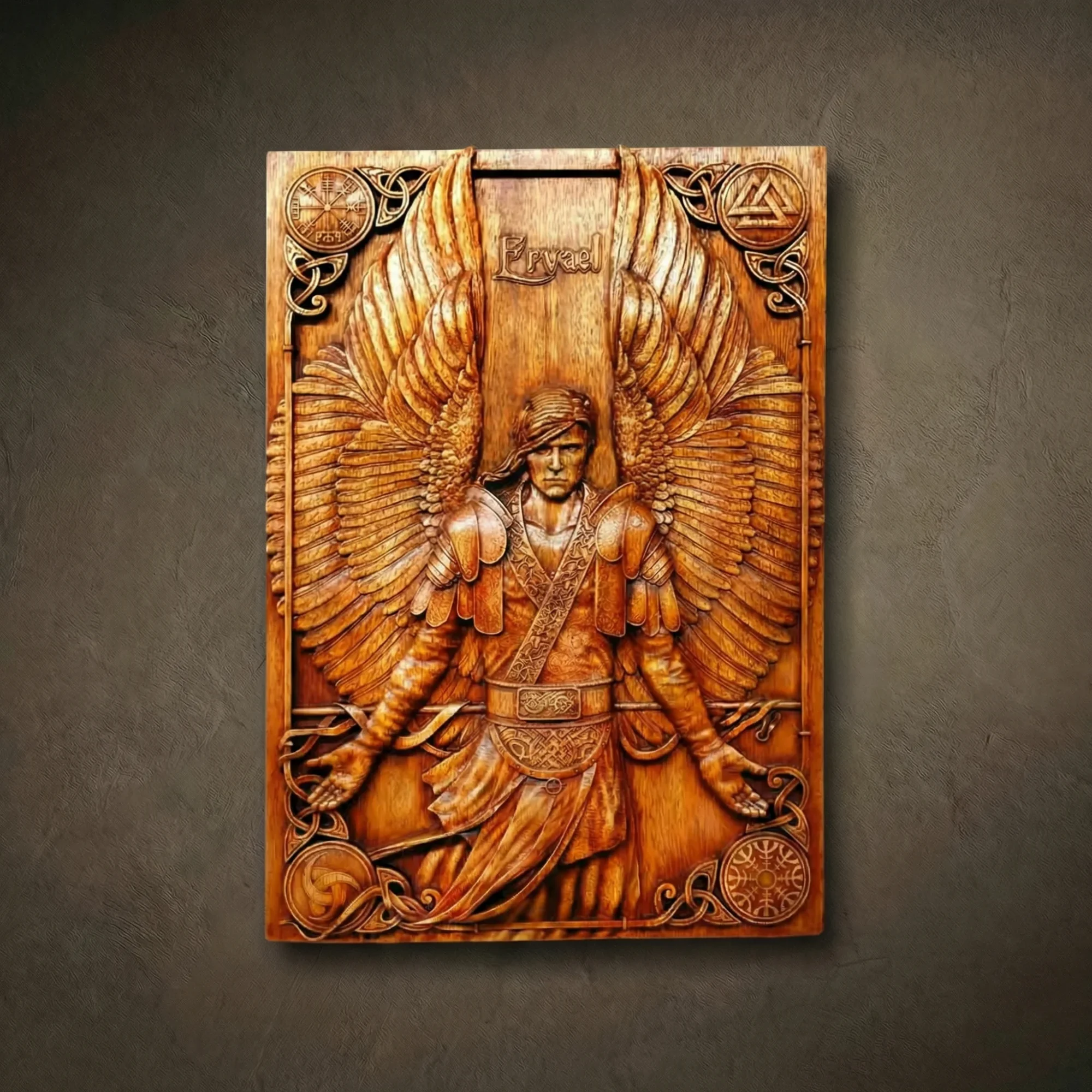 Architectural relief sculpture of an Angel in armor, hand-finished from solid Iroko wood. The central figure is framed by precisely carved Norse symbols, featuring detailed feather textures and structural anatomy. Natural golden-brown grain of the Iroko hardwood with a refined matte finish. A museum-standard wall piece designed as a lasting interior element.