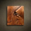 Macro relief sculpture of a horse's eye carved from Iroko wood. Intense anatomical detail of the iris and skin folds, finished with natural oil.