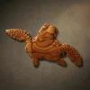 Hand-carved Iroko wood relief sculpture of a sea turtle. The carving captures the turtle in a swimming motion, featuring detailed patterns on its flippers and a smooth, contoured shell, finished with natural oil to highlight the rich wood grain. Marine wildlife wall decor.